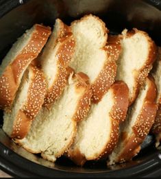 sliced bread in a slow cooker with sesame seeds