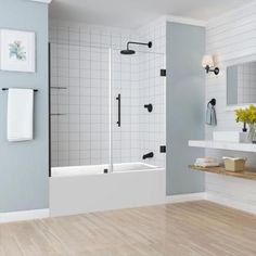 a bathroom with blue walls and white tile on the floor, including a shower stall