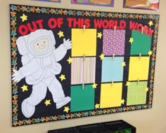 a bulletin board with an astronaut on it