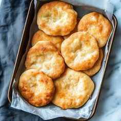 some biscuits are sitting in a pan on a table