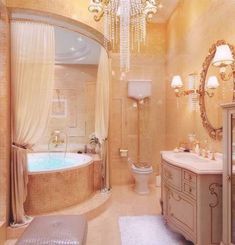 a fancy bathroom with an oval tub and chandelier