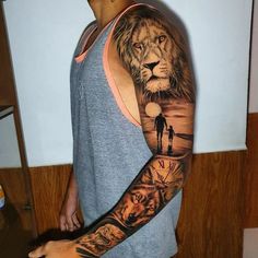 a man with a lion tattoo on his arm