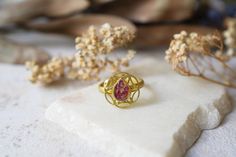 This adjustable ring is handmade with real pressed flowers encased in resin. Set in a beautiful antique gold plated brass frame on an adjustable band, this ring is like wearing a piece of nature.  Size 7 ADJUSTABLE. Burgundy queen anne's lace flowers or custom colors available. Any questions, please feel free to contact us! ✹ Custom orders available! Like what you see but don't love the colors or frame? Let us make something extra special just for you! Just send us a message and we will get back to you as soon as possible.  ✹ Indeed, you can send us YOUR flowers and we can work together to create a custom piece! For more information, see this listing: https://www.etsy.com/listing/610828449/custom-jewelry-with-your-flowers-real ✹ Items will come packaged in a beautiful gift box, ready for g Ring Teardrop, Queen Anne's Lace Flowers, Queen Anne's Lace, Queen Annes Lace, Sharp Objects, Resin Ring, Pressed Flower, Lace Flowers, Brass Frame