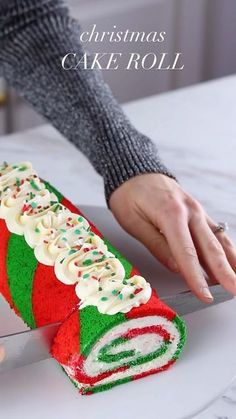 someone is decorating a christmas cake roll