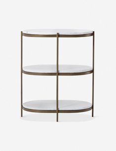 a round metal shelf with two shelves on one side and marble top, against a white background