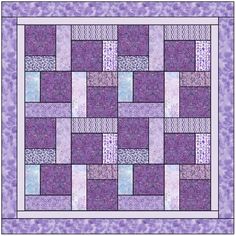 a purple and white quilt with squares on it