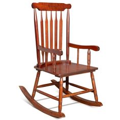 a wooden rocking chair on a white background