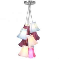 a multi - colored chandelier with five shades of different colors hanging from the ceiling