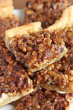 several pieces of pecan pie stacked on top of each other