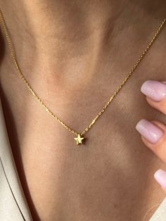 Tiny star from the sky⭐ Get this cute jewelry made with the high quality elements✨ You can go with 925K Sterling Silver with the options of Gold, Rose Gold or White Gold finish Beautiful jewelry for everyone 💙 Details * 925K Sterling Silver → 14K Gold, Rose Gold or White Gold plated * Chain length is approximately 18 inches (16+2 in extender) / 45 cm (40+5 cm extender) * Time is important! You will receive your package as soon as possible 🚚 * We care about the quality of metal to make sure it will last for a long time * We use enamel technique to color the jewelry and high quality zircons only * There can be tiny differences on each item, length difference of the chain as well as color changes and shade differences of the stones and enamel is possible since each jewelry piece is unique a Dainty 14k Gold-filled Star Charm Jewelry, Star-shaped White Gold Jewelry Gift, Star-shaped Jewelry With Star Charm As Gift For Her, Star Charm Jewelry Gift For Her, Delicate Star Charm Jewelry For Gifts, Dainty Star Charm Jewelry As A Gift For Her, Dainty Star Charm Jewelry Gift For Her, Delicate Star Charm Jewelry Gift, 14k Gold Dainty Jewelry With Star Charm