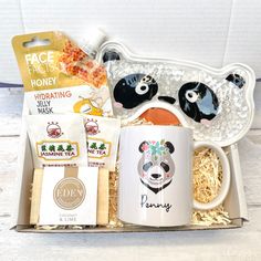 "Panda Theme Gift Box, Sleep Well Care Package, Custom Panda Mug, Animal lover Gift, Soap Gift Box, Birthday Box for Her, Womens Gift Box Panda Bear Gift Box Contains: 1. Panda Soft Eye Sleep Mask 2. 1x Custom Panda Design mug with the name of your choice 3. 2x Jasmine Tea Envelopes (may vary) 4. 1x Lime & Coconut Soap or Lemon Sunshine soap (vegan and cruelty free)  5. 1x Face Facts Honey Hydrating Face Mask (vegetarian) 6. 1x Notecard with your chosen gift message How to personalise: Write the name you would like on the mug in the \"personalisation\" section before adding to your basket.  Gift Notes: Write your gift message in the gift note section at checkout to indicate what you would like me to write in the notecard.   UK orders - If you need your order to arrive for a specific date ( Panda Mug, Panda Theme, Eco Friendly Wrapping, Coconut Soap, Panda Design, Jasmine Tea, Gift Boxes For Women, Soft Eyes, Gift Box Birthday