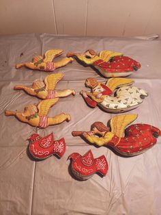 several decorative items are laid out on a sheet