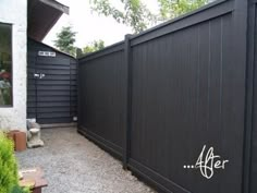 a black fence with the words after painted on it