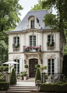 a large white house with lots of windows