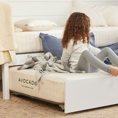 Meet the most affordable certified organic kids' mattress in America. We craft our hybrid Eco Organic Kids Mattress in Los Angeles with 704 individually wrapped coils and GOLS-certified organic latex from sustainable farms for soft, contouring support. GOTS-certified organic cotton and wool deliver breathable, luxurious comfort. No chemical flame retardants, fiberglass, or polyurethane foams. A GOTS-certified organic product (CU863637) that has earned the OEKO-TEX® STANDARD 100 label and meets E Avocado Green Mattress, Eco Friendly Mattress, Green Mattress, Trundle Bed Frame, Kids Bed Frames, Cot Mattress, Kids Mattress, Toddler Mattress, Teen Boy Bedroom