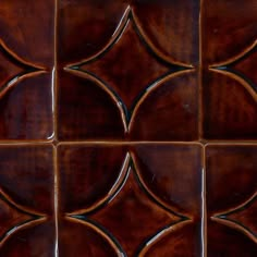 a close up view of some brown tiles