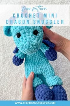 a crocheted blue dragon stuffed animal with text overlay reading free pattern crochet mini dragon snuggler