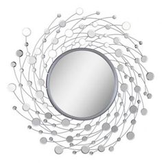 a round mirror with many circles around it