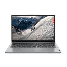 an open laptop computer sitting on top of a white surface with snow covered mountains in the background