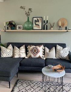 a living room filled with furniture and decor