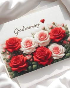 there is a card with roses on it and the words good morning written in red