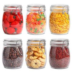 four glass jars filled with different types of pasta and veggies in each jar