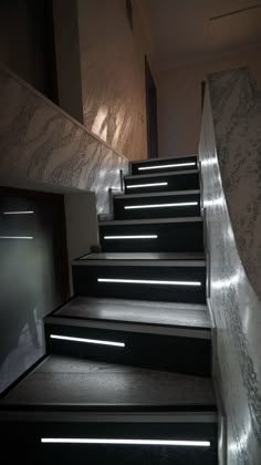 the stairs are lit up with leds to give them more light than they appear