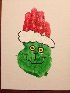 a painting of a green monster wearing a santa hat