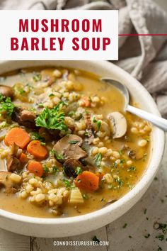 mushroom barley soup with carrots and parsley in a white bowl