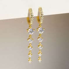 *Buy 2 items, Get 15% OFF your order. Coupon applied at checkout.* Introducing the 5 Diamond Drop Hoops - for when you want to glam up your look without going overboard! Perfect for dressy occasions, these fancy earrings feature five glistening diamonds for a touch of sparkle and sophistication. Shine on! Sold as a pair (2) 18K Gold Hoop Earrings Dangle Drop Hoops Diamond Earrings Gold Earrings Small Hoop Earrings Gold Huggie Earrings Christmas Gift for Her - Made in gold vermeil: a thick 18k gold layer on 925 sterling silver. - Hoop diameter: 7.3 mm, outer diameter: 11.2mm - Drop length: 1 inch - Waterproof, tarnish resistant & hypoallergenic - 1 Year warranty All jewelry designed and handmade by Heart Made of Gold. All photos are owned by Heart Made of Gold GIFT WRAP AVAILABLE TO PURCHAS Small Hoop Earrings Gold, Diamond Earrings Gold, Earrings Small Hoop, Gold Huggie Earrings, Valentines Gift For Her, Fancy Earrings, Small Hoop Earrings, Hoop Earrings Gold, North Hollywood