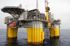 an oil and gas platform in the middle of the ocean stock photo - 957982