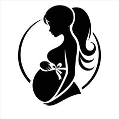 a pregnant woman holding her belly in the shape of a circle with a bow on it