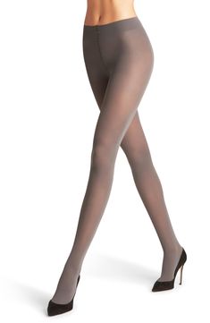 These versatile tights in a flattering matte finish are made with flat seams and a wide waistband for long-lasting comfort. Lined gusset Polyamide/elastane Hand wash cold, dry flat Imported Hosiery Sleek Smoothing Elastane Tights, Compressive Elastane Tights, Smoothing Elastane Tights, Elegant Fitted Hosiery With Soft Touch, Elegant Fitted Soft Touch Hosiery, Micro-elastic Soft Touch Elastane Tights, Elegant High Stretch Solid Tights, Elegant High Stretch Solid Color Tights, Elegant Thigh High Elastane Hosiery