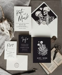 wedding stationery with skeleton artwork and black envelopes