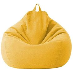 a yellow bean bag chair sitting on top of a white floor