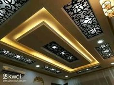 the ceiling is decorated with intricate designs and lights