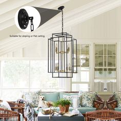 a living room filled with furniture and a birdcage hanging over it's head