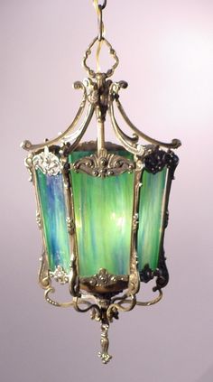 a green lamp hanging from the ceiling