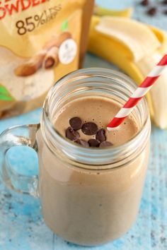 a smoothie in a mason jar with chocolate chips on top