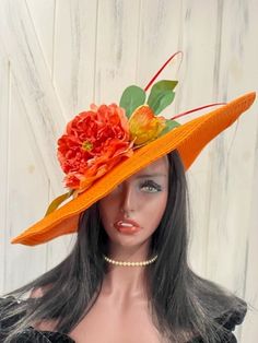 Ready to ship today from Tennessee, USA. I ship quickly and package safely in boxes.  See more  distinctive hat choices at my Etsy shop at https://www.etsy.com/shop/equineelan   This hat has an oversize brim of 6 inches for a total width of 19 inches and is a vibrant rich orange color with a big gorgeous peony flower. The flower is a beautiful mix of peach, pink and coral tones. Two dark orange/coral colored quills kick this hat into Derby Couture. Wear it level on your head or tilt it over one Orange Curved Brim Hat For Spring, Orange Short Brim Hat For Spring, Orange Straw Hat With Curved Brim For Spring, Orange Curved Brim Straw Hat For Spring, Spring Orange Straw Hat With Curved Brim, Orange Wide Brim Sun Hat For Spring, Orange Wide Brim Straw Hat For Spring, Orange Wide Brim Hat For Spring, Orange Curved Brim Sun Hat For Spring