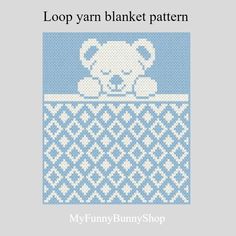 a blue and white knitted teddy bear in a basket with the words lop yarn blanket pattern