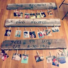 a family tree made out of wooden planks with pictures hanging on clothes pegs