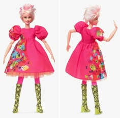 the doll is wearing a pink dress and green tights with colorful flowers on it