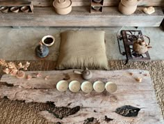 an overhead view of pottery and other items on display