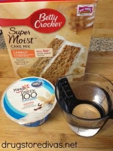 ingredients for cake sitting on a counter top next to a package of cheesecake mix