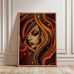 a painting on a wall with a woman's face painted in orange and black