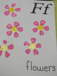 a paper with flowers painted on it and the letters f is for flowers written below