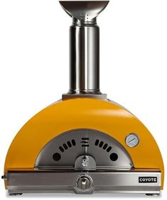 a yellow stove top oven sitting on top of a counter