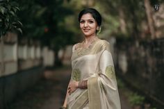 Fabric :   Tissue with machine embroidery Color :      light green Kasavu :   Light Kasavu Pallu :       5 inch Kasavu Border :    4 inch Kasavu Tussles(Kunchalam) : yes Blouse :    With approx. 1 mtr Unstitched Blouse Saree length : 6.25 meter with blouse This is a special weave from the talented weavers of Kuthampully  Gentle cold water hand wash only. Dry clean recommended.   Do not soak in detergent for a longer duration. Traditional Embroidered Pista Green Pre-draped Saree, Pista Green Saree With Traditional Motifs, Pista Green Saree With Motifs, Pista Green Traditional Wear With Motifs For Wedding, Polka Dot Saree, Checks Saree, Kerala Saree, Set Saree, Green Saree