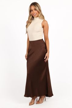 DETAILS   Slip into this skirt and you'll instantly feel its magic. The satin sheen finish makes you stand out whether you're heading to brunch with friends or a night out on the town.    midi length  elastic waistband  side invisible zip  frayed hem  satin sheen finish  unlined    material - 100% polyester    SIZING    m odel is 5' 5" and wears a Size S    model stats: bust - 31.5", waist - 25.5", hips - 37" Brunch With Friends, Invisible Zip, S Models, Midi Length, Midi Skirt, Night Out, Satin, Elastic, Skirt